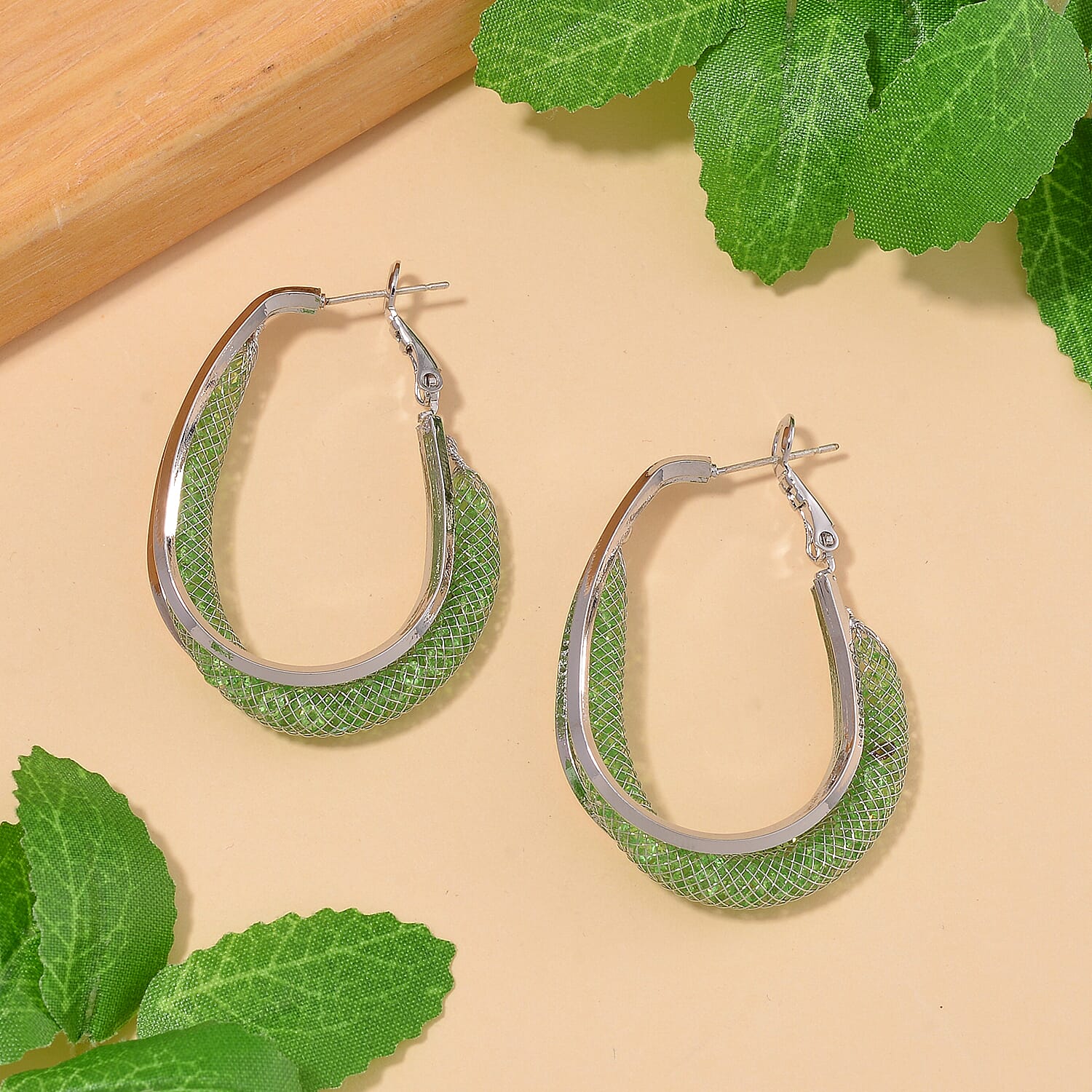 NY Closeout Deal- Star Light Crochet Austrian Green Crystal Hoop Earrings in White Tone