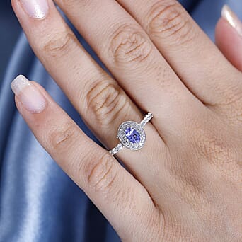 https://tjcuk.sirv.com/Products/78/4/7844422/Tanzanite-White-Zircon-Ring-in-Rhodium-Overlay-Sterling-Silver-1-17-ct_7844422_2.jpg?w=342&h=342