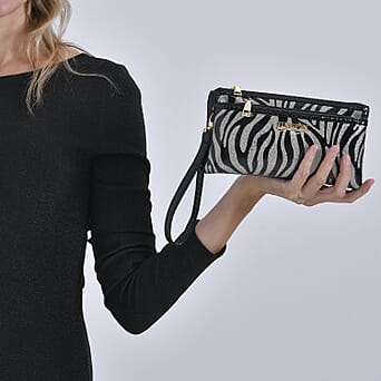 https://tjcuk.sirv.com/Products/78/4/7849596/Leatherette-Zebra-Pattern-Crossbody-Bag-Zebra_7849596_2.jpg?w=342&h=342