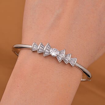 https://tjcuk.sirv.com/Products/78/5/7856824/Designer-Inspired-White-Cubic-Zirconia-Ballerina-Bangle-Size-7-5_7856824_1.jpg?w=342&h=342