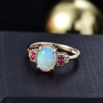 https://tjcuk.sirv.com/Products/78/6/7862850/9K-Yellow-Gold-Ethiopian-Opal-African-Ruby-White-Diamond-Ring-1-40-Ct_7862850_1.jpg?w=342&h=342