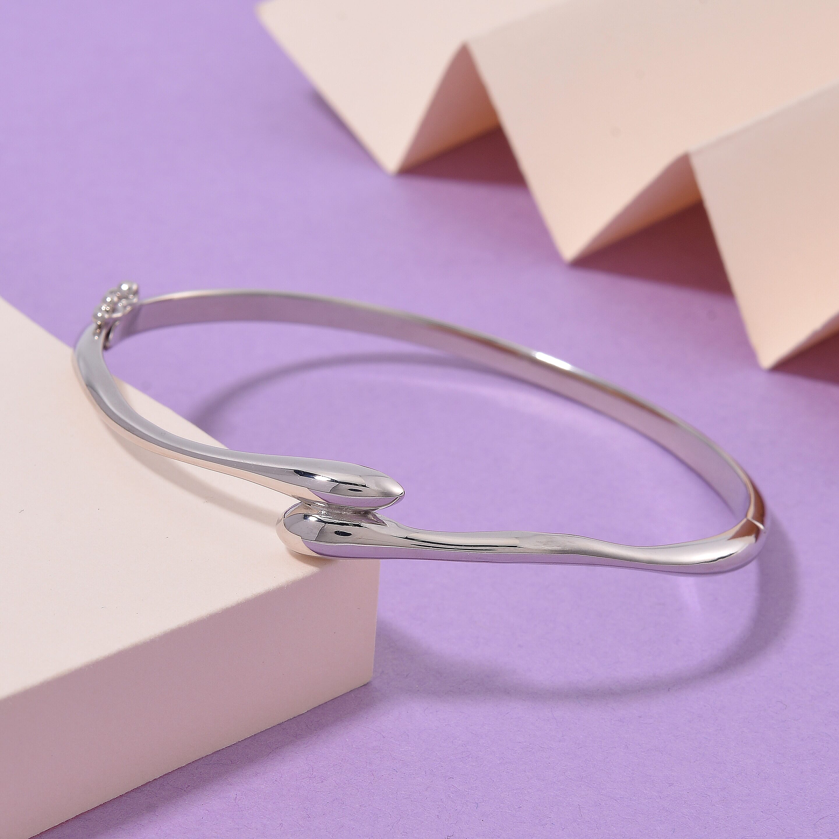 Lucy Q Drop Collection Rhodium Overlay Sterling Silver Drop Bangle (Size - 8)