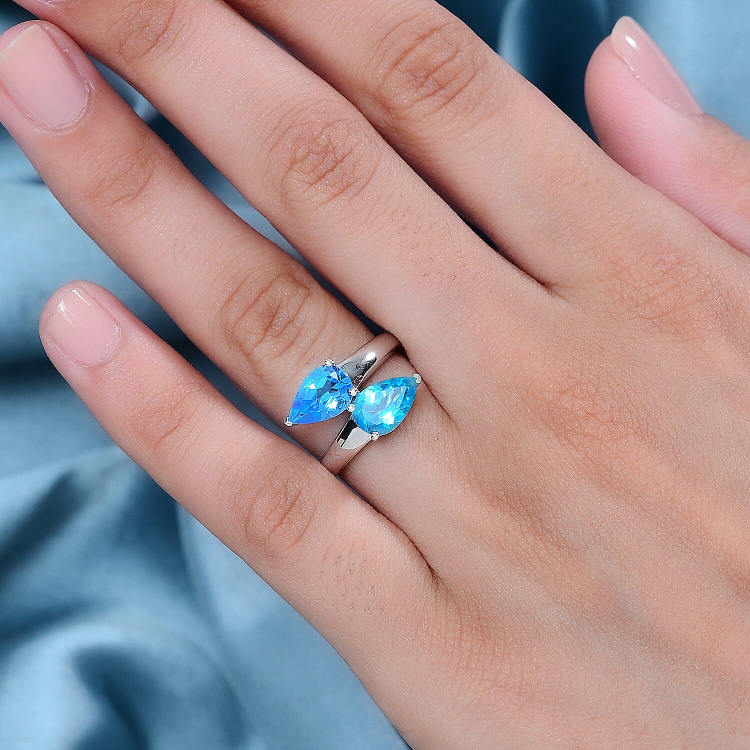Gem Fiesta - Electric BlueTopaz Bypass Ring in Rhodium Overlay Sterling Silver 2.958 Ct.