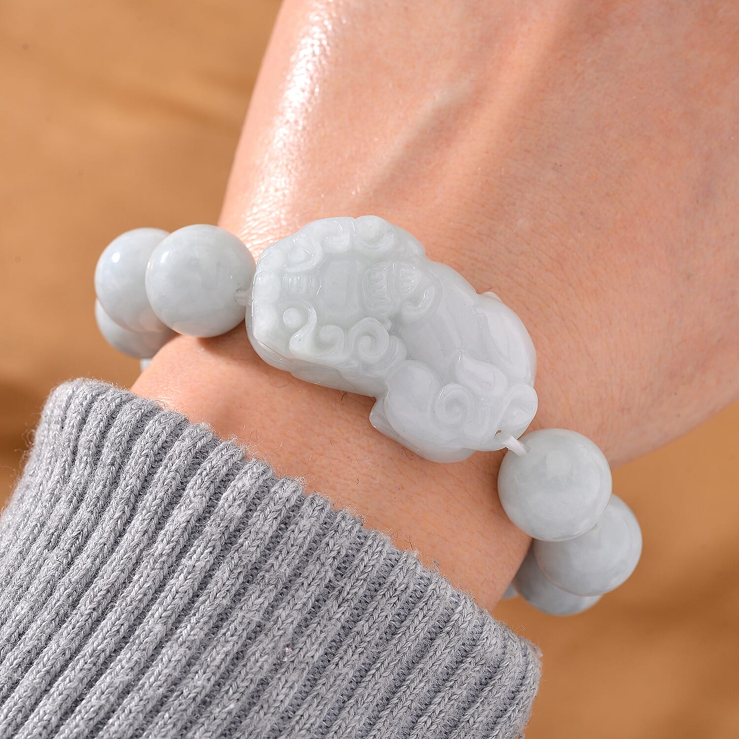 Natural Type A White Jadeite Bracelet With Pixiu Carving (Size - 7.5 Stretchable) 330.0 Ct.