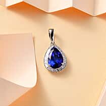 RHAPSODY 5.46 Ct. AAAA Tanzanite, Diamond Halo Drop Pendant in 950 Platinum (VS/E-F)