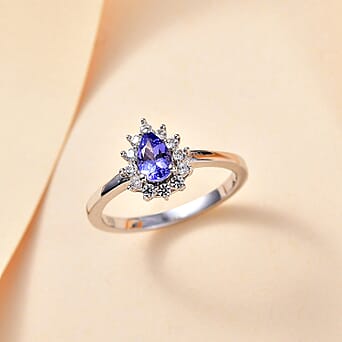 https://tjcuk.sirv.com/Products/79/3/7938816/Tanzanite-White-Zircon-Main-Stone-With-Side-Stone-Ring-in-rhodium-Ster_7938816_1.jpg?w=342&h=342