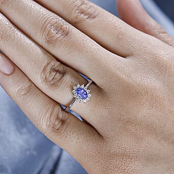 https://tjcuk.sirv.com/Products/79/3/7938845/Tanzanite-White-Zircon-Main-Stone-With-Side-Stone-Ring-in-rhodium-Ster_7938845_2.jpg?w=342&h=342