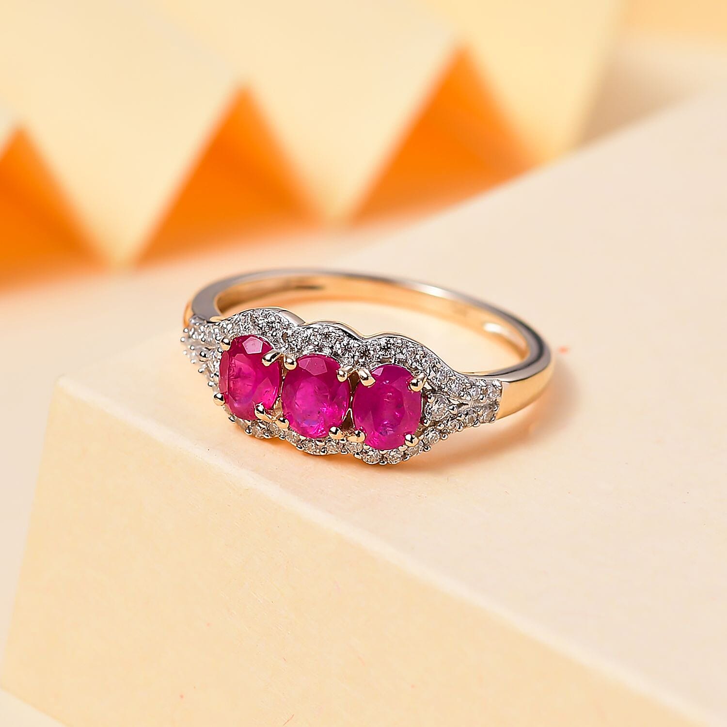 Rare Find - 9K Yellow Gold Premium Mozambique Pink Sapphire & Moissanite Trilogy Ring 1.70 Ct. Rare Find - 9K Yellow Gold Premium Mozambique Pink Sapphire & Moissanite Trilogy Ring 1.70 Ct.