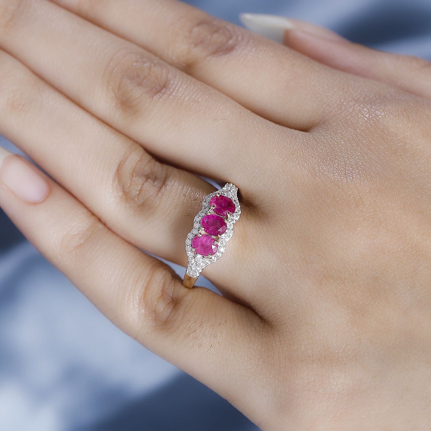 Rare Find - 9K Yellow Gold Premium Mozambique Pink Sapphire & Moissanite Trilogy Ring 1.70 Ct. Rare Find - 9K Yellow Gold Premium Mozambique Pink Sapphire & Moissanite Trilogy Ring 1.70 Ct.