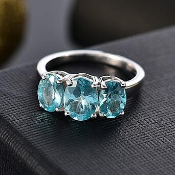 https://tjcuk.sirv.com/Products/79/7/7970044/Lagoon-Apatite-Main-Stone-With-Side-Stone-Ring-in-rhodium-Sterling-Sil_7970044_1.jpg?w=342&h=342