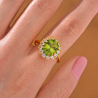 https://tjcuk.sirv.com/Products/79/7/7972436/Peridot-Natural-Chrome-Diopside-White-Zircon-Solitaire-Ring-in-18K-Ver_7972436_1.jpg?w=342&h=342