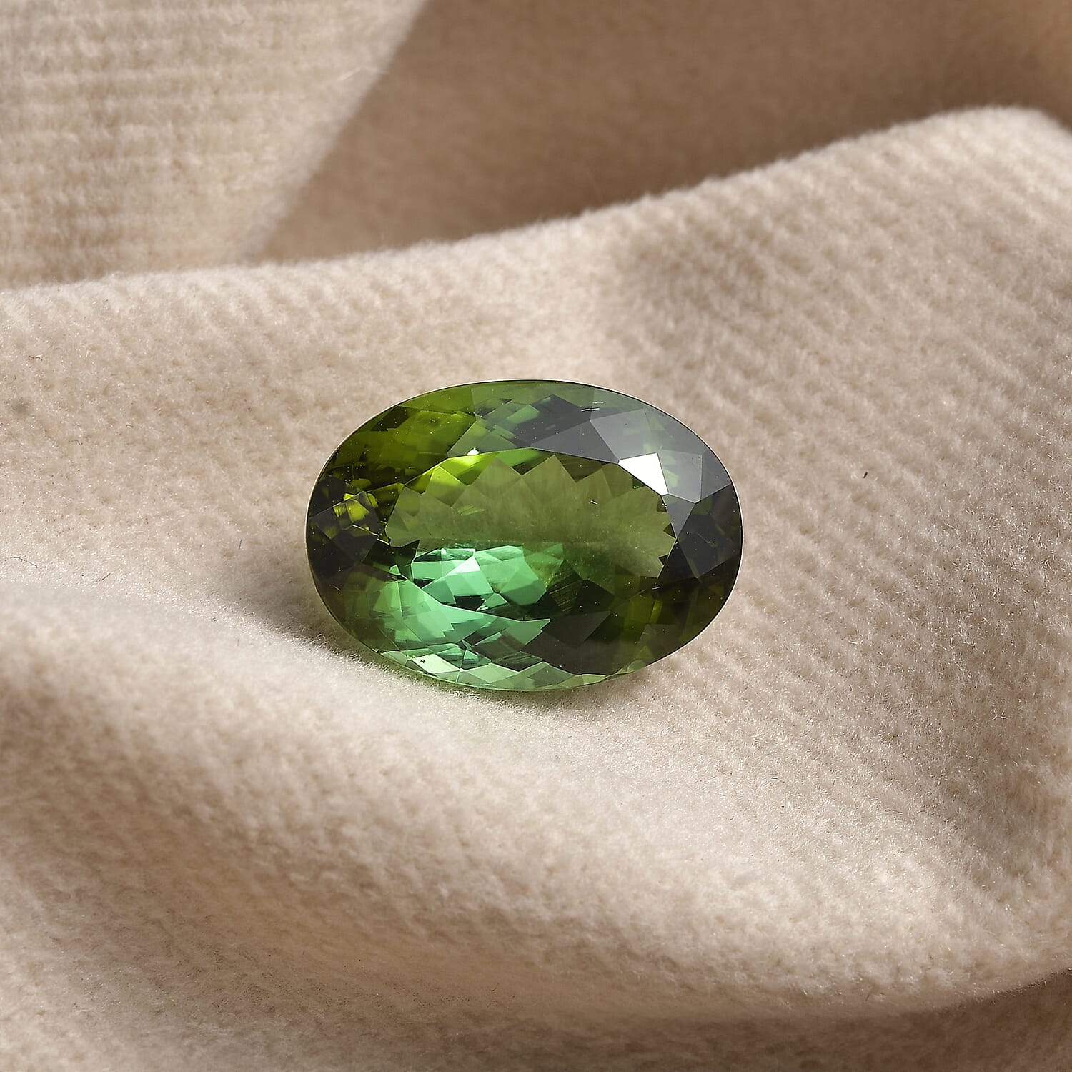 AAA GSI Certified Yellowish Green Tourmaline Oval Shape Gemstone 12.69 Ct. AAA GSI Certified Yellowish Green Tourmaline Oval Shape Gemstone 12.69 Ct.