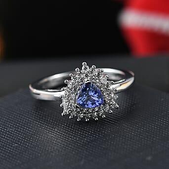 https://tjcuk.sirv.com/Products/79/9/7994029/Tanzanite-White-Zircon-Main-Stone-With-Side-Stone-Ring-in-Rhodium-Over_7994029_1.jpg?w=342&h=342