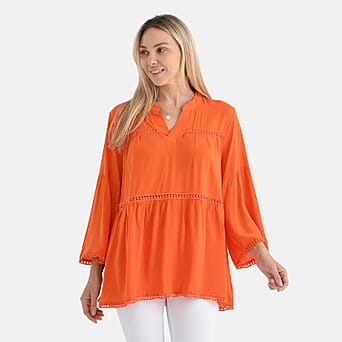 https://tjcuk.sirv.com/Products/80/3/8034382/Tamsy-Spring-V-Neck-Loose-Fit-Top-with-Crochet-Trim-One-Size-Orange_8034382_3.jpg?w=342&h=342