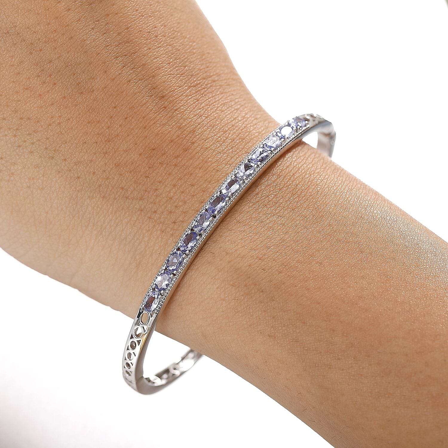 Tanzanite Full Bangle (Size 7.5) in Rhodium Overlay Sterling Silver Silver Wt. 12.35 Gms.