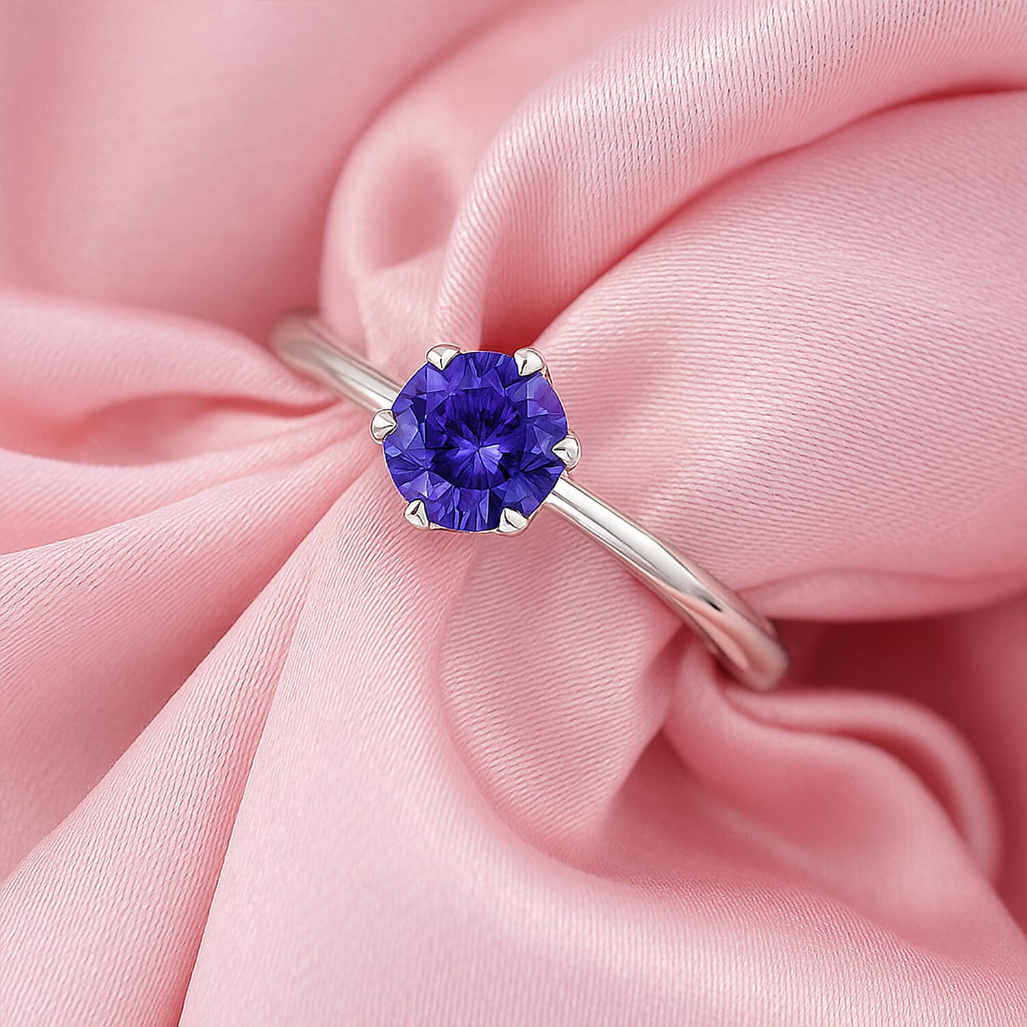 Rhapsody 950 Platinum AAAA Tanzanite Solitaire Ring, Platinum Wt. 3.95 Gms.