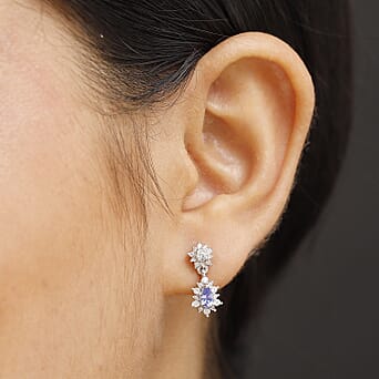 https://tjcuk.sirv.com/Products/80/6/8061815/Tanzanite-White-Zircon-Dangling-Earring-in-Rhodium-Overlay-Sterling-Si_8061815_2.jpg?w=342&h=342