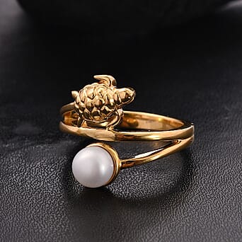 https://tjcuk.sirv.com/Products/80/7/8070722/GP-Giuseppe-Perez-White-Pearl-Blue-Sapphire-Fancy-Ring-in-18K-YG-Verme_8070722_1.jpg?w=342&h=342