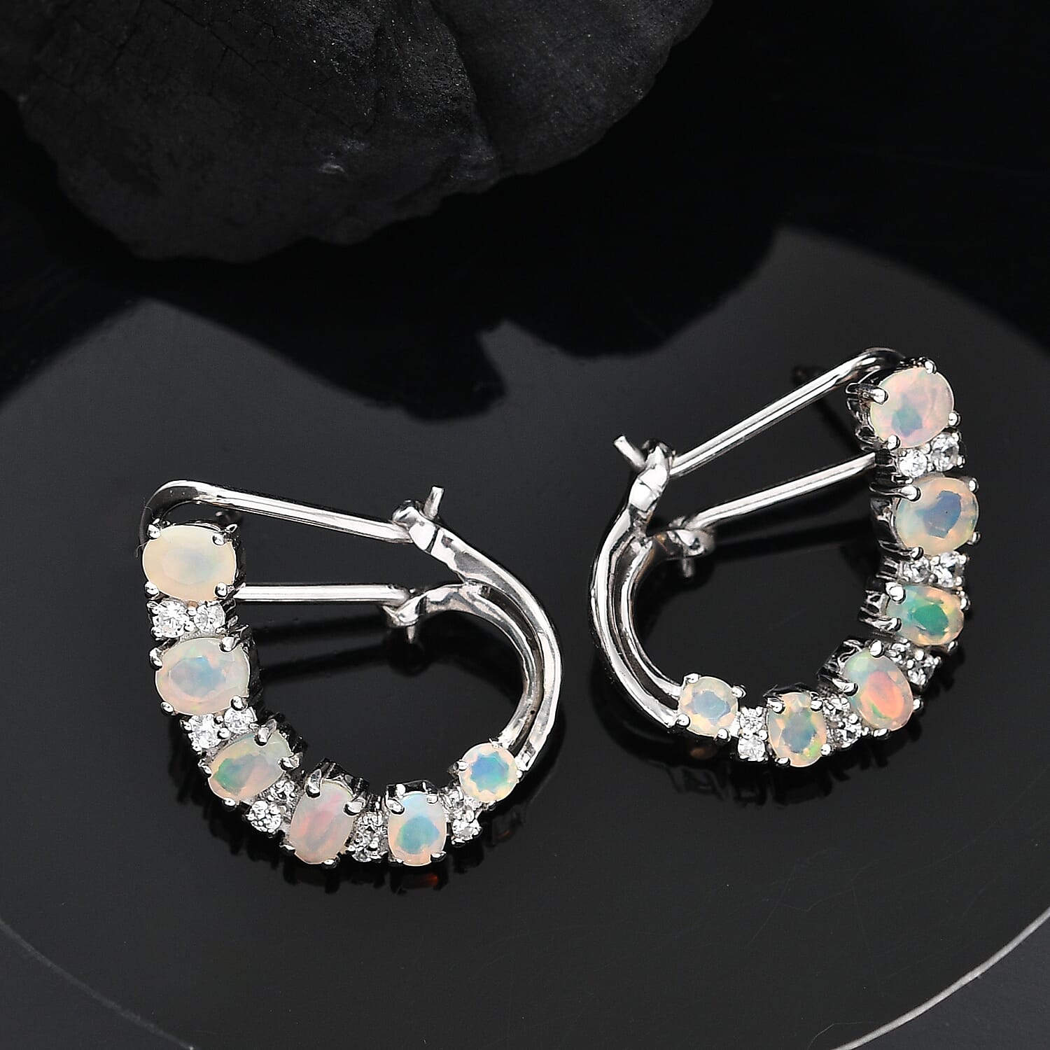 Ethiopian Faceted Opal & White Zircon Earring with Omega Clip in Rhodium Overlay Sterling Silver 2.34 Ct. Ethiopian Faceted Opal & White Zircon Earring with Omega Clip in Rhodium Overlay Sterling Silver 2.34 Ct.