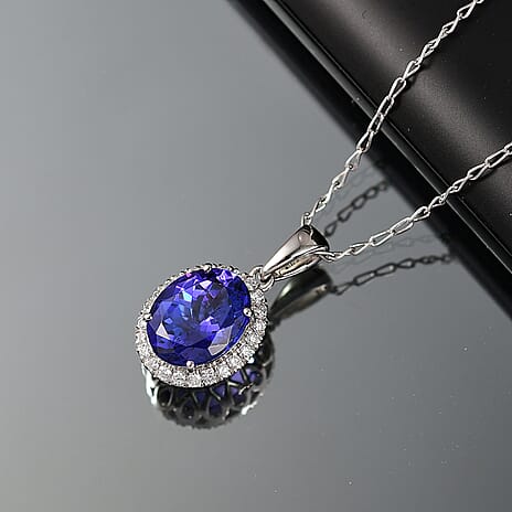 Rhapsody 950 Platinum AAAA Tanzanite White Diamond EF, VS Solitaire Pendant, Platinum Wt.3 Gms  3.220  Ct.