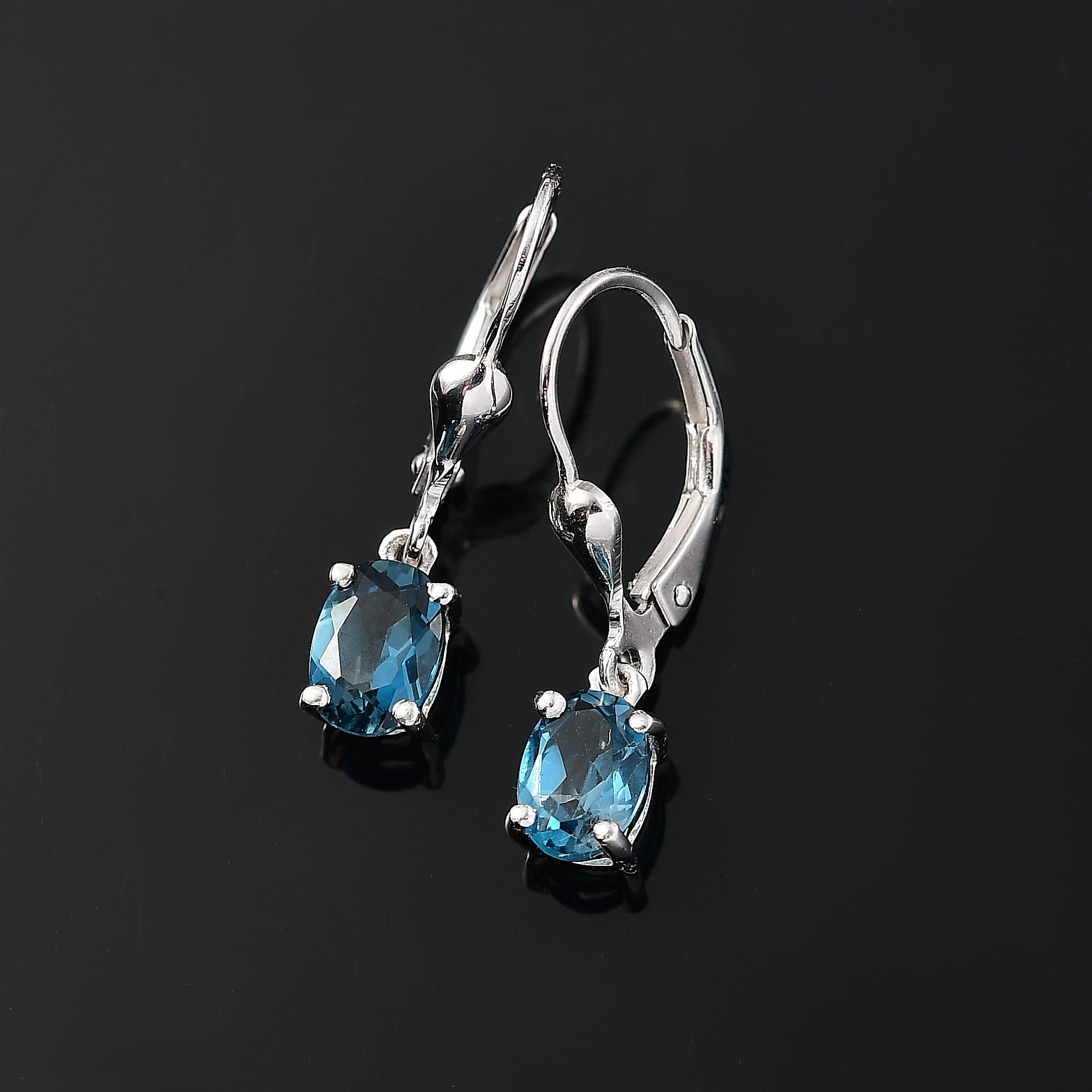 London Blue Topaz Earring with Lever Back in Platinum Overlay Sterling Silver 1.77 Ct. London Blue Topaz Earring with Lever Back in Platinum Overlay Sterling Silver 1.77 Ct.
