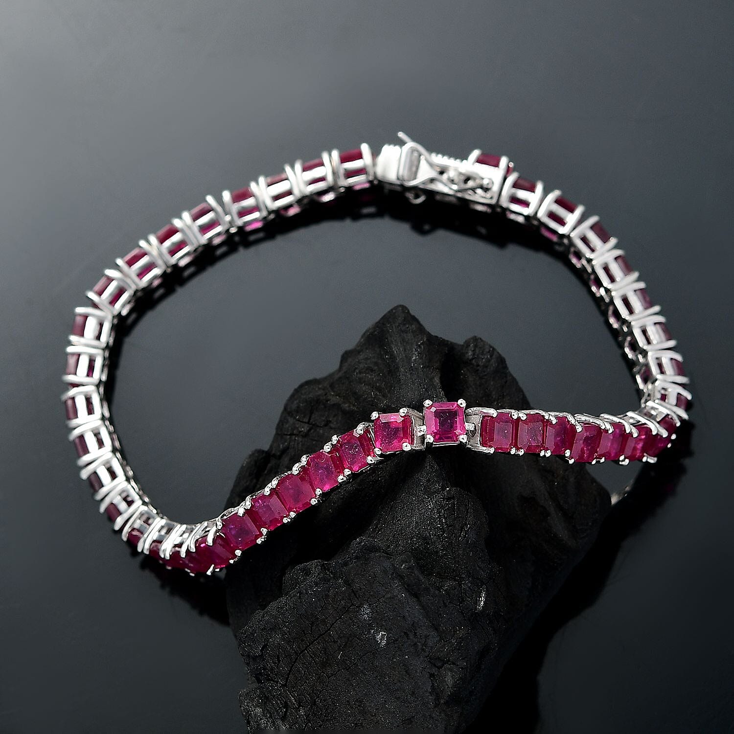 African Ruby Tennis Bracelet (Size - 7) with GB Lock Box in Rhodium Overlay Sterling Silver 22.23 Ct, Silver Wt. 9.64 Gms. African Ruby Tennis Bracelet (Size - 7) with GB Lock Box in Rhodium Overlay Sterling Silver 22.23 Ct, Silver Wt. 9.64 Gms.