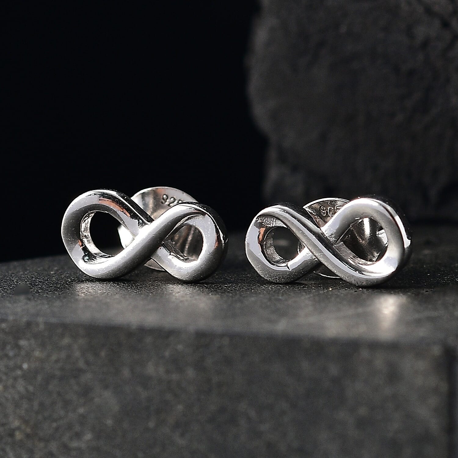 Designer Inspired - Infinity Stud Push Back Earring in Rhodium Overlay Sterling Silver