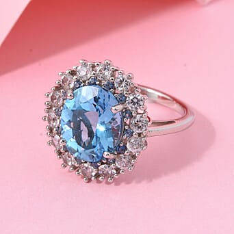 https://tjcuk.sirv.com/Products/81/2/8128322/Swiss-Blue-Topaz-Blue-Sapphire-White-Zircon-Ring-in-Rhodium-OverlaySte_8128322_1.jpg?w=342&h=342