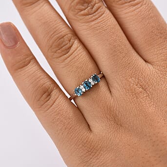 https://tjcuk.sirv.com/Products/81/3/8134373/London-Blue-Topaz-White-Zircon-3-Stone-Ring-in-Platinum-OverlaySterlin_8134373_1.jpg?w=342&h=342