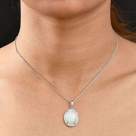 Luxuriant 950 Platinum AAAA Ethiopian Opal Lab Grown Diamond (SI-GH) Solitaire Pendant 6.50 Ct, Platinum Wt. 4.55 Gms.