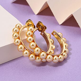 https://tjcuk.sirv.com/Products/81/6/8162545/Golden-Colour-Shell-Pearl-Earrings-with-Push-Backs-in-Yellow-Gold-Plat_8162545_1.jpg?w=342&h=342