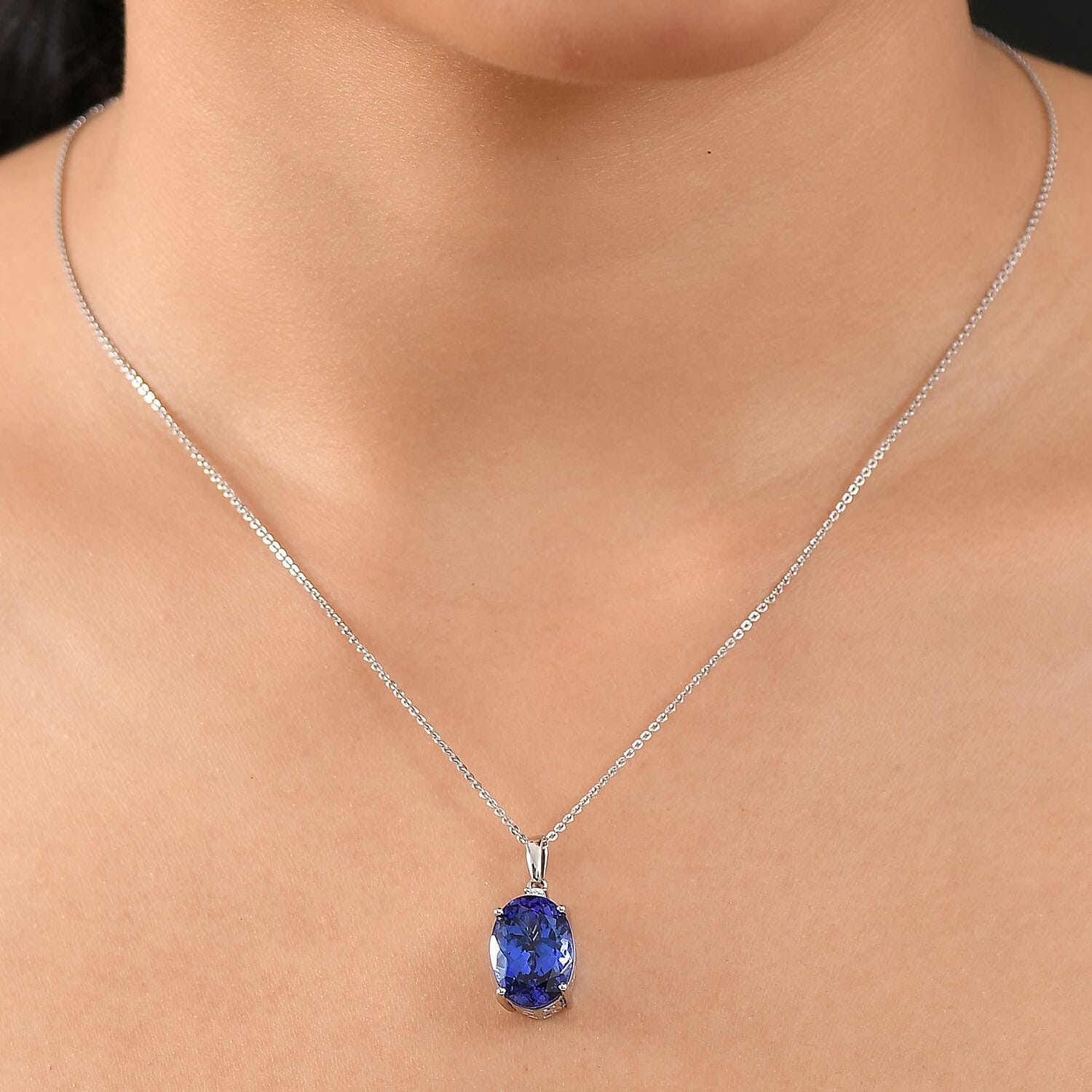 Rhapsody 950 Platinum AAAA Tanzanite & White Diamond (VS-EF) Solitaire Pendant 8.77 Ct, Platinum Wt. 3.06 Gms.