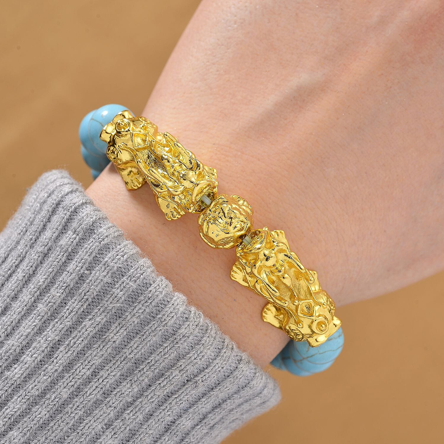 Blue Howlite Beads & Pixiu Bracelet (Size 7 Streachable) in Yellow Gold Plated 150.00 Ct.