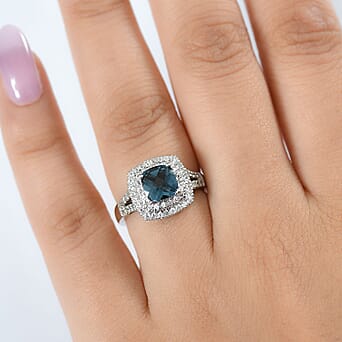https://tjcuk.sirv.com/Products/81/8/8181204/London-Blue-Topaz-White-Zircon-Ring-in-Rhodium-Overlay-Sterling-Silver_8181204_2.jpg?w=342&h=342