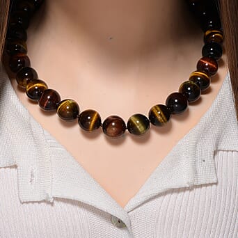 https://tjcuk.sirv.com/Products/81/8/8185324/Tucson-Find-Multi-Color-Tiger-Eye-Necklace-Beads-16-MM-Size-20-2-Ext-i_8185324_1.jpg?w=342&h=342