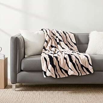 https://tjcuk.sirv.com/Products/81/8/8188325/LIVMORE-Zebra-Print-Faux-Fur-Cosy-Blanket-200x150-cm-Off-White-Black-5_8188325_1.jpg?w=342&h=342