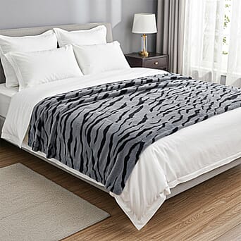 https://tjcuk.sirv.com/Products/81/8/8188329/LIVMORE-Zebra-Print-Faux-Fur-Cosy-Blanket-200x150-cm-Grey-Black-560-GS_8188329.jpg?w=342&h=342