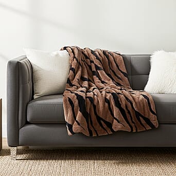 https://tjcuk.sirv.com/Products/81/8/8188331/LIVMORE-Zebra-Print-Faux-Fur-Cosy-Blanket-200x150-cm-Brown-Black-560-G_8188331_1.jpg?w=342&h=342