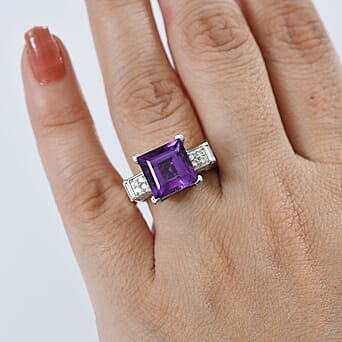 https://tjcuk.sirv.com/Products/81/9/8191099/African-Amethyst-White-Zircon-Solitaire-Ring-in-Rhodium-OverlaySterlin_8191099_2.jpg?w=342&h=342