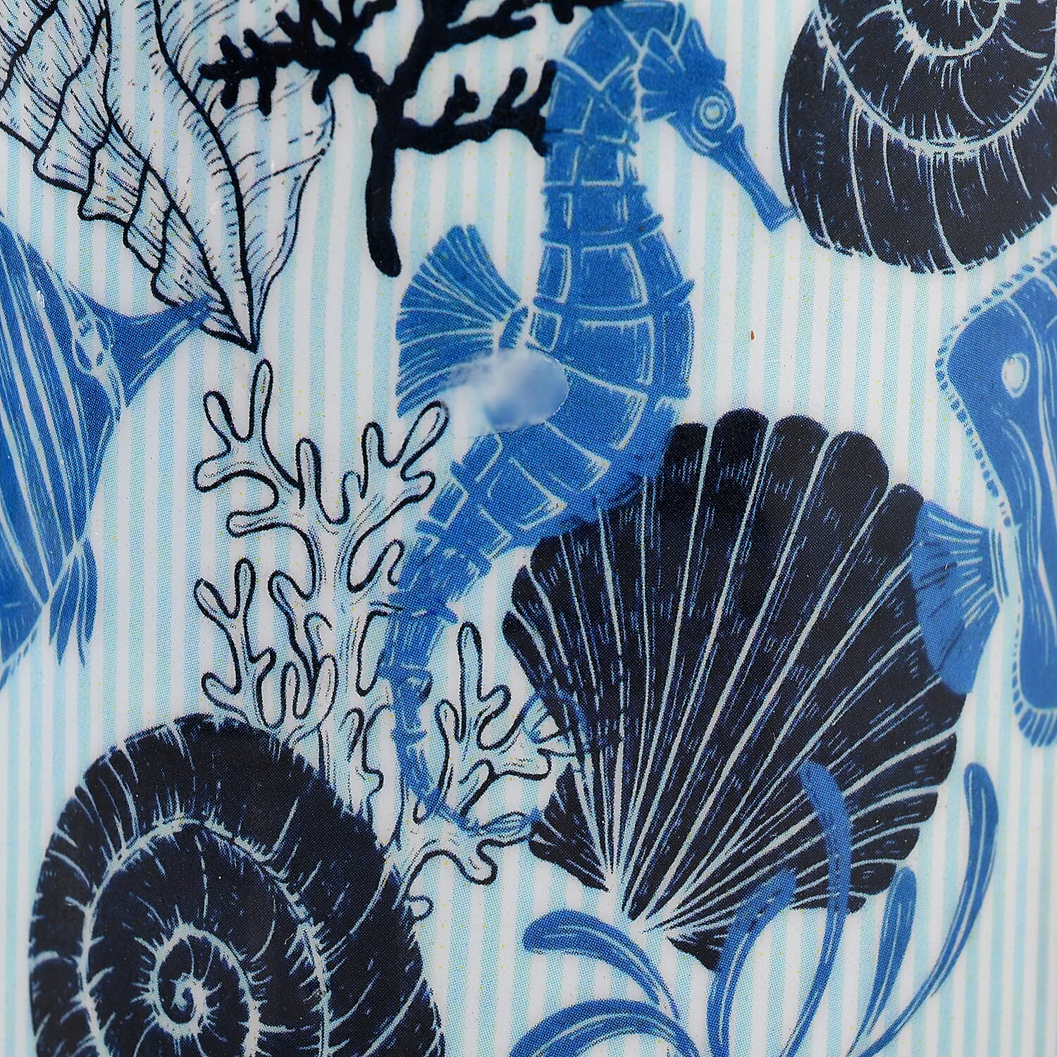 Scented Paraffin Wax Candle in Spiral Shell Printed Metal Jar (250 ml)