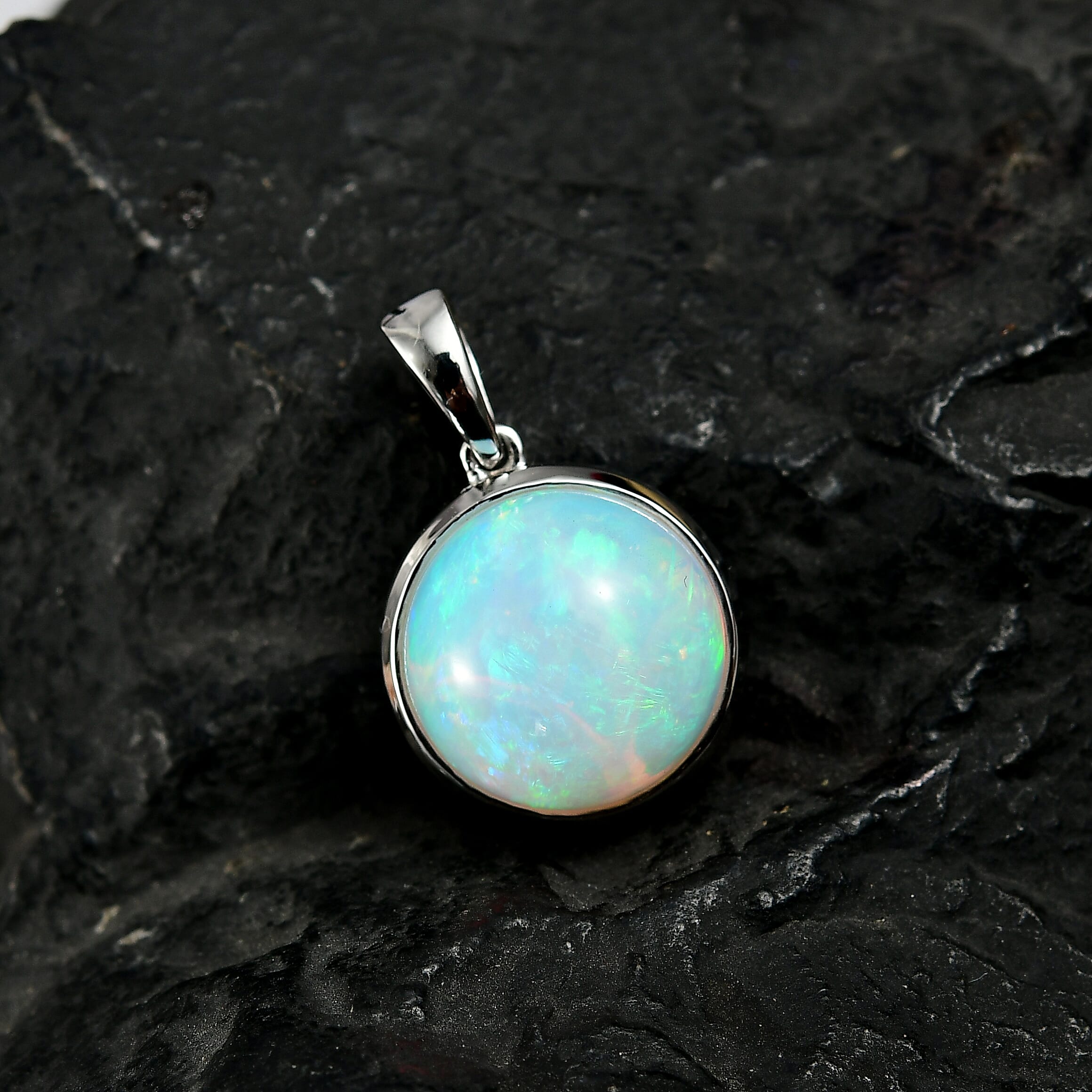 Rhapsody 950 Platinum AAAA Ethiopian Opal Solitaire Pendant 5.05 Ct, Platinum Wt. 4.74 Gms.