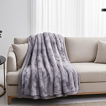 https://tjcuk.sirv.com/Products/81/9/8198365/THE-MOST-LUXURIOUS-BLANKET-AT-IW-HUSH-HAVEN-Luxury-Faux-Fur-Blanket-wi_8198365.jpg?w=342&h=342