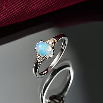https://tjcuk.sirv.com/Products/82/1/8216453/Ethiopian-Opal-White-Zircon-Solitaire-Ring-Sterling-Silver-0-545-Ct_8216453_1.jpg?w=342&h=342