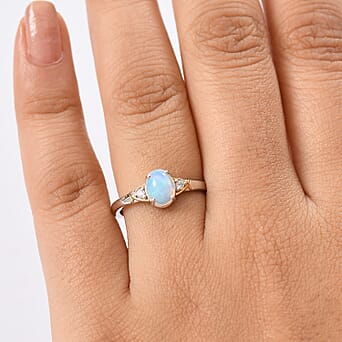 https://tjcuk.sirv.com/Products/82/1/8216453/Ethiopian-Opal-White-Zircon-Solitaire-Ring-Sterling-Silver-0-545-Ct_8216453_2.jpg?w=342&h=342