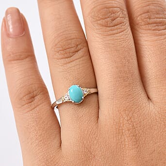 https://tjcuk.sirv.com/Products/82/1/8216482/Lagoon-Turquoise-White-Zircon-Solitaire-Ring-Sterling-Silver-0-776-Ct_8216482_2.jpg?w=342&h=342
