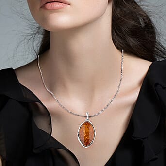 https://tjcuk.sirv.com/Products/82/1/8219687/Tucson-Find-Amber-Pendant-Sterling-Silver-17-00-Ct-Silver-Wt-5-50-Gms_8219687_1.jpg?w=342&h=342