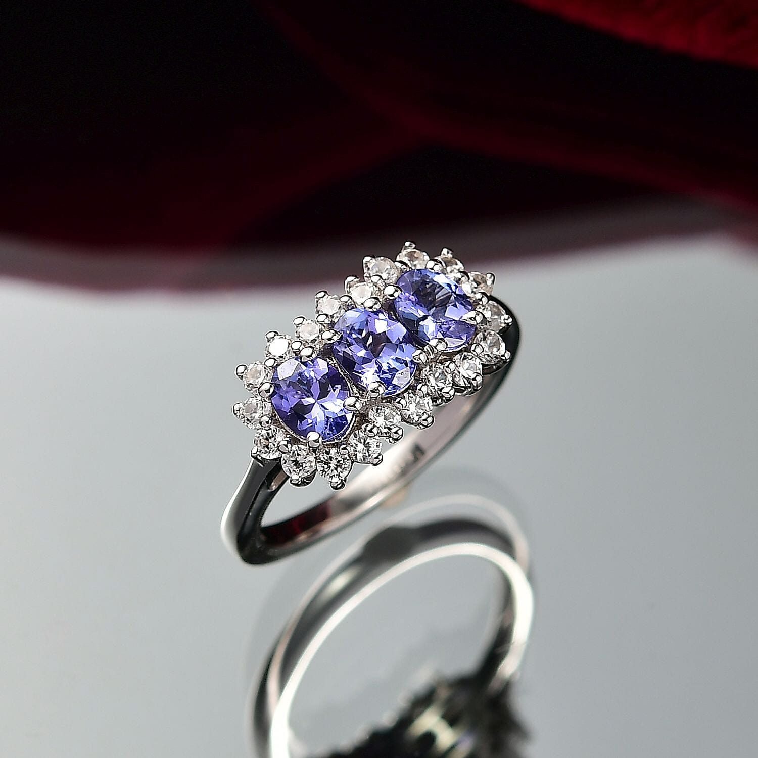 D’joy Tanzanite, White Zircon Main Stone With Side Stone Ring in Platinum OverlaySterling Silver  1.752  Ct.