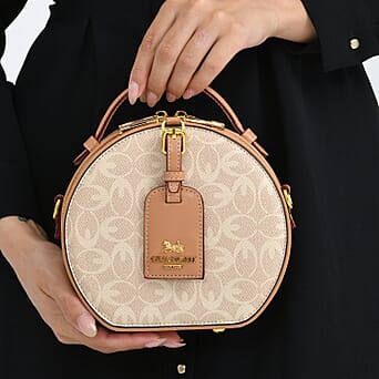 https://tjcuk.sirv.com/Products/82/3/8231265/Guanchi-Round-Crossbody-Bag-with-Top-Handle-Beige_8231265_3.jpg?w=342&h=342