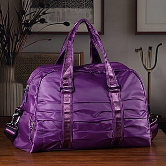https://tjcuk.sirv.com/Products/82/3/8231661/Patterned-Travel-Bag-Size-52x19x28-cm-Purple_8231661_1.jpg?w=342&h=342