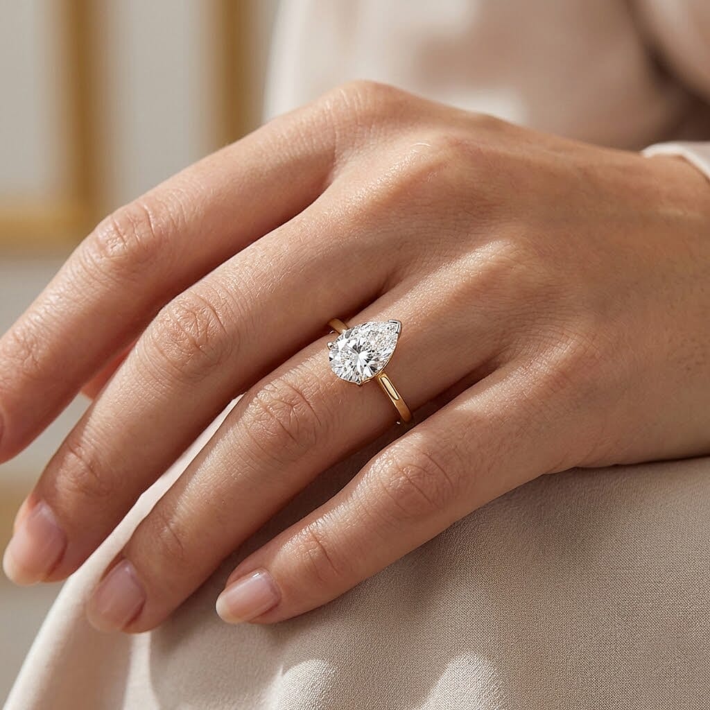 Luxuriant 14K Yellow Gold SGL Certified Lab Grown Diamond (VS-EF) Pear Cut Solitaire Ring